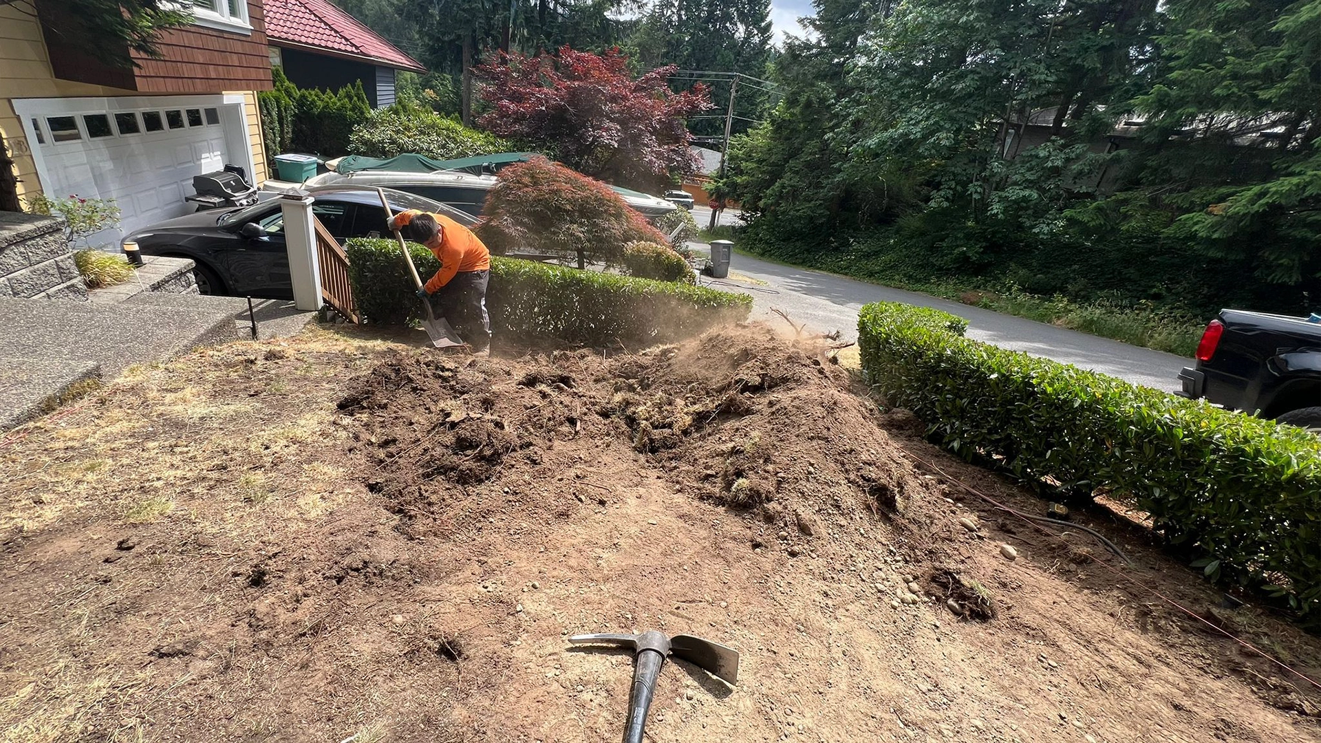 Ecua Landscaping professional working on a landscape project