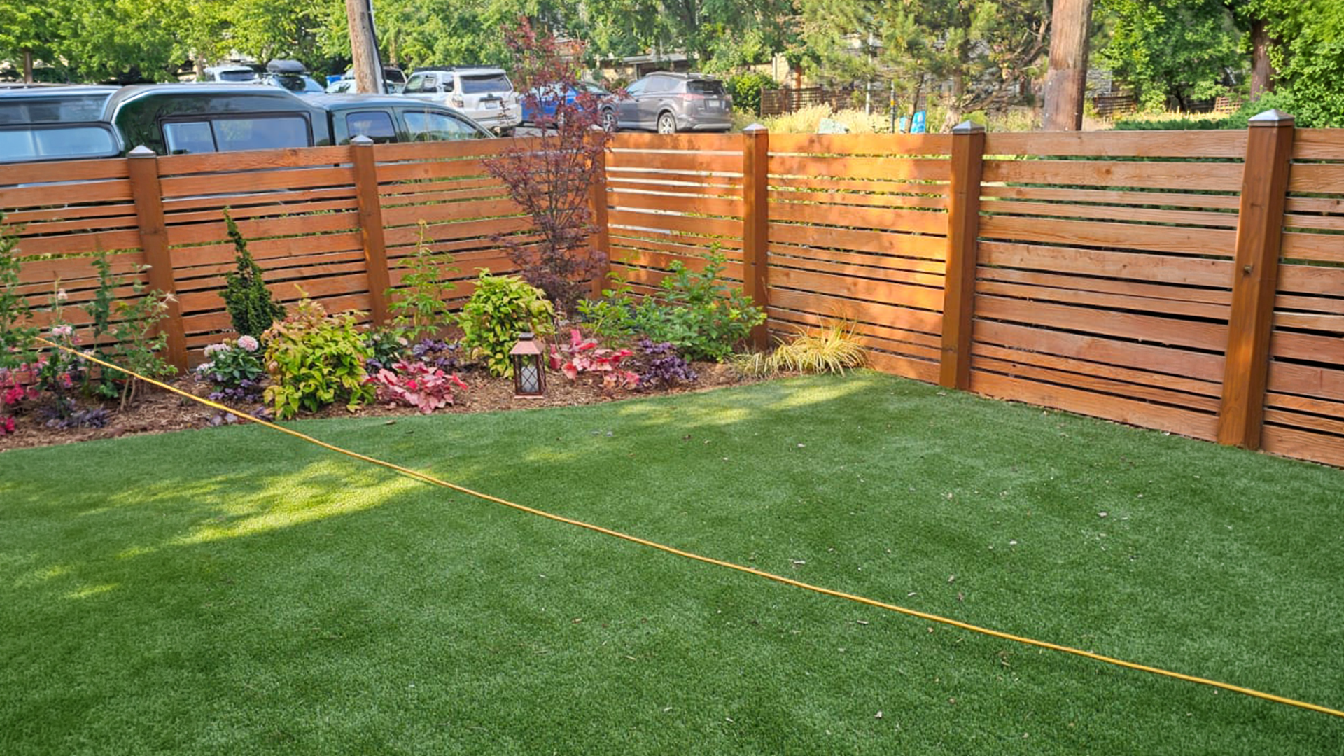 Wood Privacy Fence Installation in Washington by Ecua Landscaping, photo 2 of 6